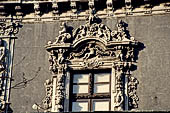 Catania Palazzo Biscari - decorated window of the facade of the palace. 