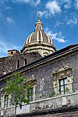 Catania  the dome of the cathedral towering above the facade of the Palazzo Episcopale 