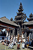 Pura Gelap - Mother Temple of Besakih - Bali. Temple ceremony in the third courtyard and the imposing Kori Augung in the background. 