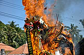Cremation ceremony - The fuel ignites under the pyre and the splendid tower - coffin, offerings, decorations - is engulfed in flames. 