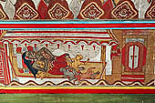 Detail of a panel from the Bale Kambang, Floating Pavilion, in the Kerta Gosa complex, Klungkung Semarapura, Bali. This panel depicts a scene from the Pan and Men Brayut story showing Men Brayut nursing several of her eighteen children.
