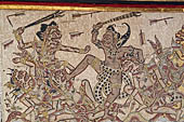 Klungkung - Bali. The Kerta Gosa palace, paintings of the lower levels This episode shows the hero Bima, dressed in the black and white checked cloth, in battle with several of the demonic figures who inhabit the underworld.