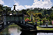 Tirtagangga, Bali - The stone bridges connecting the demon island in the middle of the south pond.