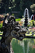 Tirtagangga, Bali - Detail of the bridge of the south pond with the fountain tower in the background.