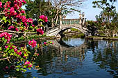 Tirtagangga, Bali - The stone bridges connecting the demon island in the middle of the south pond.