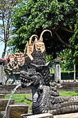 Tirtagangga, Bali - Details of the various fountains pouring water in the ponds.