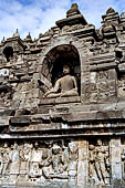 Borobudur - The outer wall of the first balustrade decorated with reliefs of celestial beings and guardian demons. 