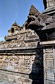 Borobudur - Water sprouts shaped like makaras are used on the lowest level, at the upper levels kala-like faces are used. 