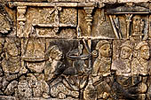Borobudur reliefs - First Gallery, Western side - Panel 56. Episode from the avadana with the scales weighing the dove and the flesh of the king.