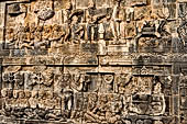 Borobudur reliefs - First Gallery, Western side - Lalitavistara. Panel 68. Sakiamuni puts on the robe of a hunter.
