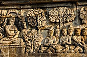 Borobudur reliefs - First Gallery, Northern side - Panel 79. Sakyamuni making the gesture of refusal to the deities offering magical strength.