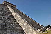 The Pyramid of Kukulcan, or the Castle (el Castillo), the most imposing structure at Chichen Itza. The balustrades of the northern staircase originate from two feathered serpent's heads, effigy of Kukulcan. 