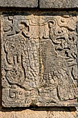 Chichen Itza - The Platform of the Eagles and Jaguars. Bas-relief of a eagle devouring the heart of a defeated victim. 