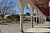 Brightly painted colonnade in Izamal.