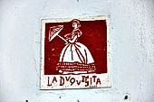 Merida - street sign plaques at the corner of the roads. 