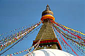 Bodhnath - The finial with the famous eyes and the pinnacle with thirteen steps. 
