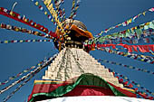 Bodhnath - The finial with the famous eyes and the pinnacle with thirteen steps. 