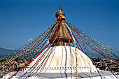 Bodhnath - the huge hemispherical dome of the stupa with the finial with the famous eyes and the pinnacle with thirteen steps. 