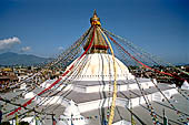 Bodhnath - the huge hemispherical dome of the stupa sits on a three-tier platform with the shape of a mandala. 
