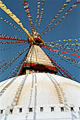 Bodhnath - the huge hemispherical dome of the stupa with the finial with the famous eyes and the pinnacle with thirteen steps. 