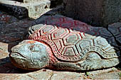 Changu Narayan - The turtle at the base of the 'conch' pillar (sankha). West facade of the main temple. 