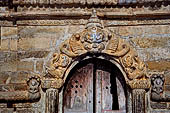 Changu Narayan - the group of the NW side of the temple courtyard: decoration detail of Krishna shrine. 