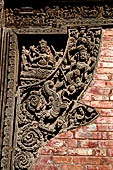 Gokarna Mahadev - richly carved triple wooden doorways.