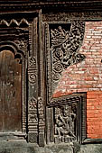Gokarna Mahadev - richly carved triple wooden doorways.