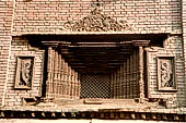 Kathmandu - the famous wooden window called 'deshay madu'.