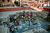Patan - North of Durbar Square, On the western side of Kumbheswar temple the Konti-hiti tank where local women usually gather.