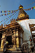 Swayambhunath - On each side of the stupa the elaborately decorated gilt copper shrines of the five Buddha.