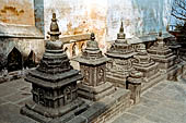 Swayambhunath Stupa - small votive caityas near the temple of Santipura.