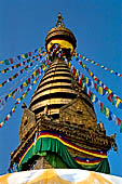 Swayambhunath - The finial of the dome of the stupa. The golden pinnacle has thirteen tiers symbolising the ultimate stage of spiritual development.