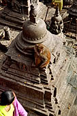 Swayambhunath Stupa - Small votive caitya nearby the statue of the Buddha of light.