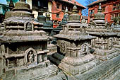 Swayambhunath Stupa - Cluster of thirty-four votive caityas of various types nearby the statue of the Buddha of light.