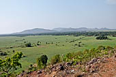 Lalitgiri - view across the lush green fields of the plain below the mahastupa.