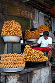 Orissa - Puri, Orissa - Puri, the Grand road, the main street of Puri. Tea stalls with oily sweets swarming with flies. 