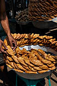 Orissa - Puri, Orissa - Puri, the Grand road, the main street of Puri. Tea stalls with oily sweets swarming with flies.