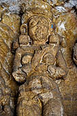 Udaigiri Cave 1 Rani Gumpha Queen's Cave - decorations of the three doorways of the veranda of the left wing of the ground floor. Detail of the first tableau (from left).