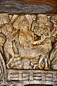 Udaigiri Cave 1 Rani Gumpha Queen's Cave - friezes of the upper storey. The story of a Kalinga queen carried away by Ashoka after the Kalinga battle. The fifth tableau: details of the bacchanalian scene.