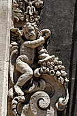 Catania Palazzo Biscari - details of the rich decoration of the windows of the facade. 