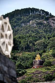 Aluvihara cave temples - The white dagoba at the top of the complex offers fine views of the surroundings. 