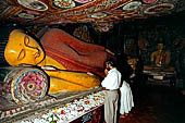 Aluvihara cave temples - Cave 1. The ten-metre long reclining Buddha statue. 