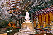 Dambulla cave temples - Cave 4, Paccima Viharaya (Western Temple). The small dagoba was broken in searching for treasures. 