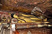 Dambulla cave temples - Cave 3, Maha Alut Viharaya (Great New Temple), reclining  Buddha carved out of solid rock.  