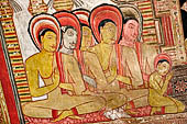 Dambulla cave temples - Cave 3, Maha Alut Viharaya (Great New Temple), paintings of the ceiling show the future Buddha, Maitreya, preaching in a Kandyan-looking pavilion to a group of ascetic disciples. 