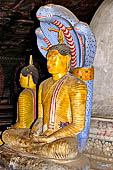 Dambulla cave temples - Cave 2, Maharaja Vihara (Temple of the Great Kings) mucalinda naga Buddha. 
