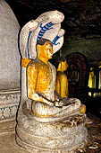 Dambulla cave temples - Cave 2, Maharaja Vihara (Temple of the Great Kings) mucalinda naga Buddha. 