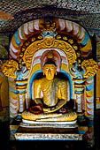 Dambulla cave temples - Cave 4, Paccima Viharaya (Western Temple). Buddha figure sits under an elaborate makara torana arch.  