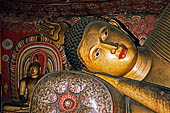 Dambulla cave temples - Cave 3, Maha Alut Viharaya (Great New Temple), reclining  Buddha carved out of solid rock. 